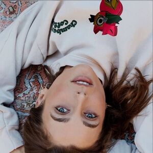 Emma Chamberlain hoodie from her brand, Chamberlain Coffee. New